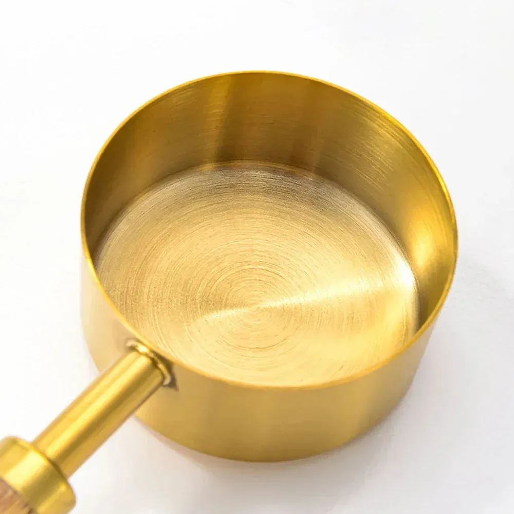8 Piece Gold Stainless Steel Measuring Set With Wooden Handles